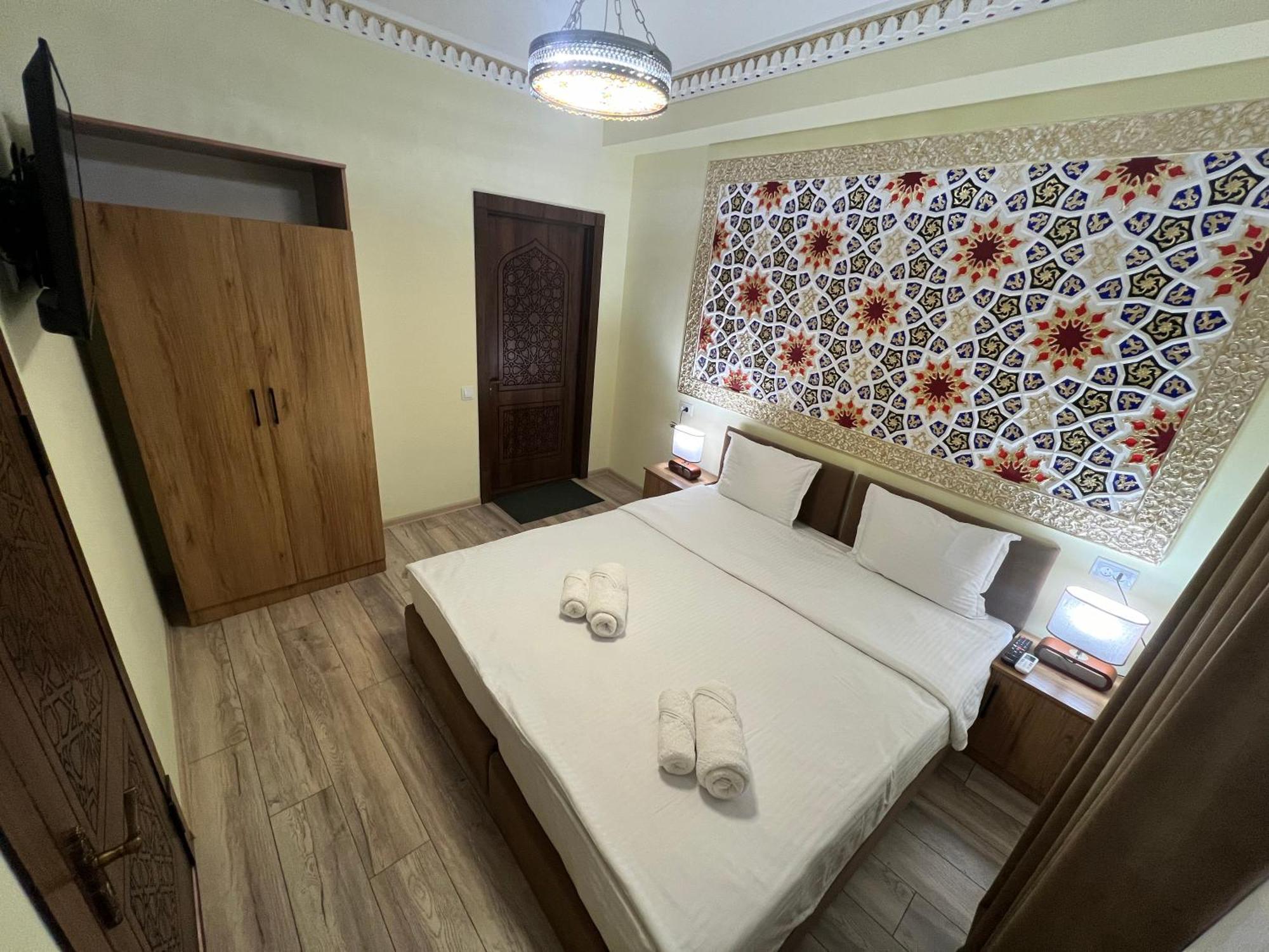 Everland Guest House Bukhara Bagian luar foto