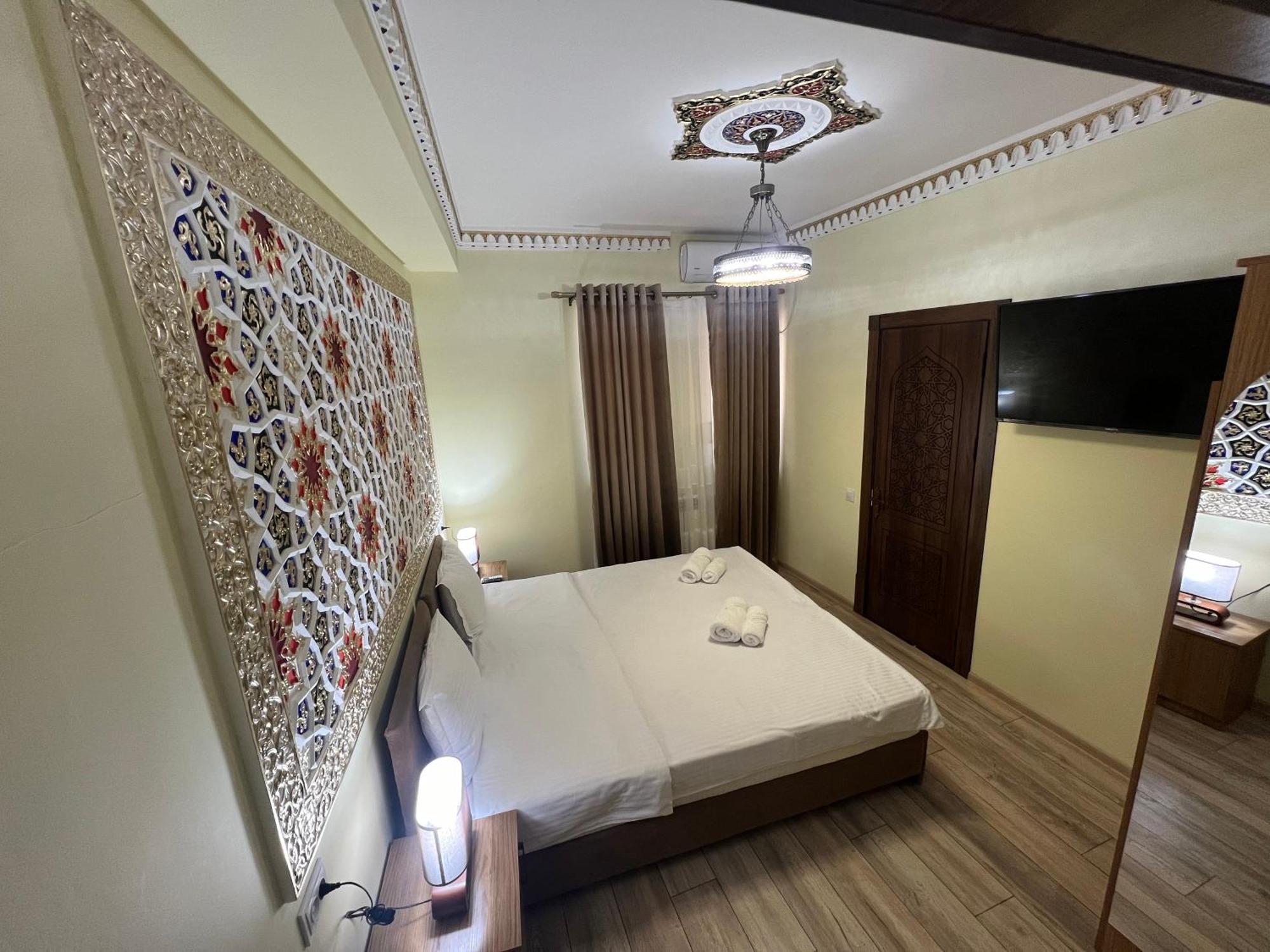Everland Guest House Bukhara Bagian luar foto